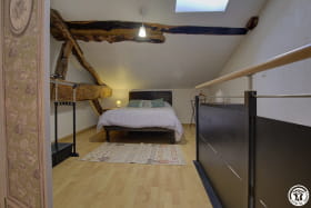 La mezzanine comprends un lit en 140 et un lit en 90.