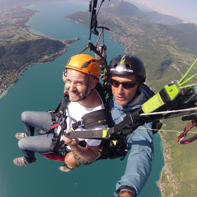 Instructional paragliding flight with instructor above lake Annecy