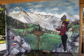 Photo de peinture sur la façade de la maison de l'environnement de Chamrousse