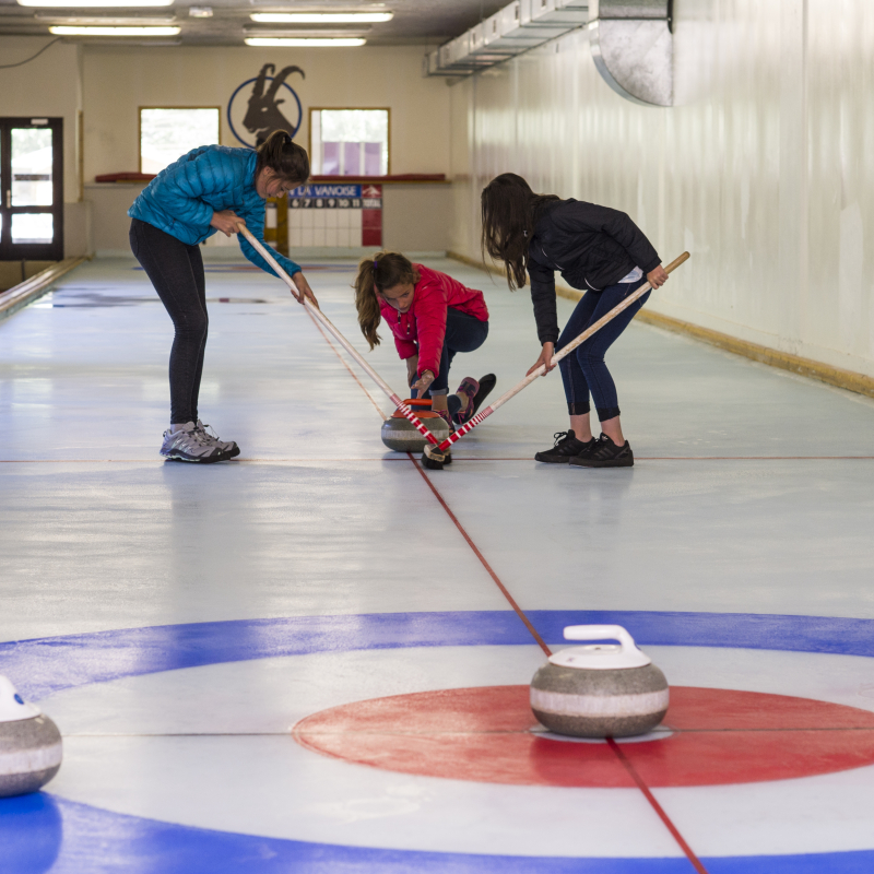 Friends trying curling together