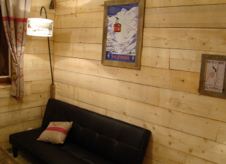 Studio à louer pour vos vacances à Val d'Isère - Ambiance chalet coin salon