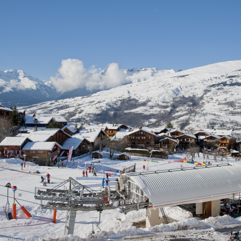Children's ski garden and Montchavin chairlift at the bottom of the slopes